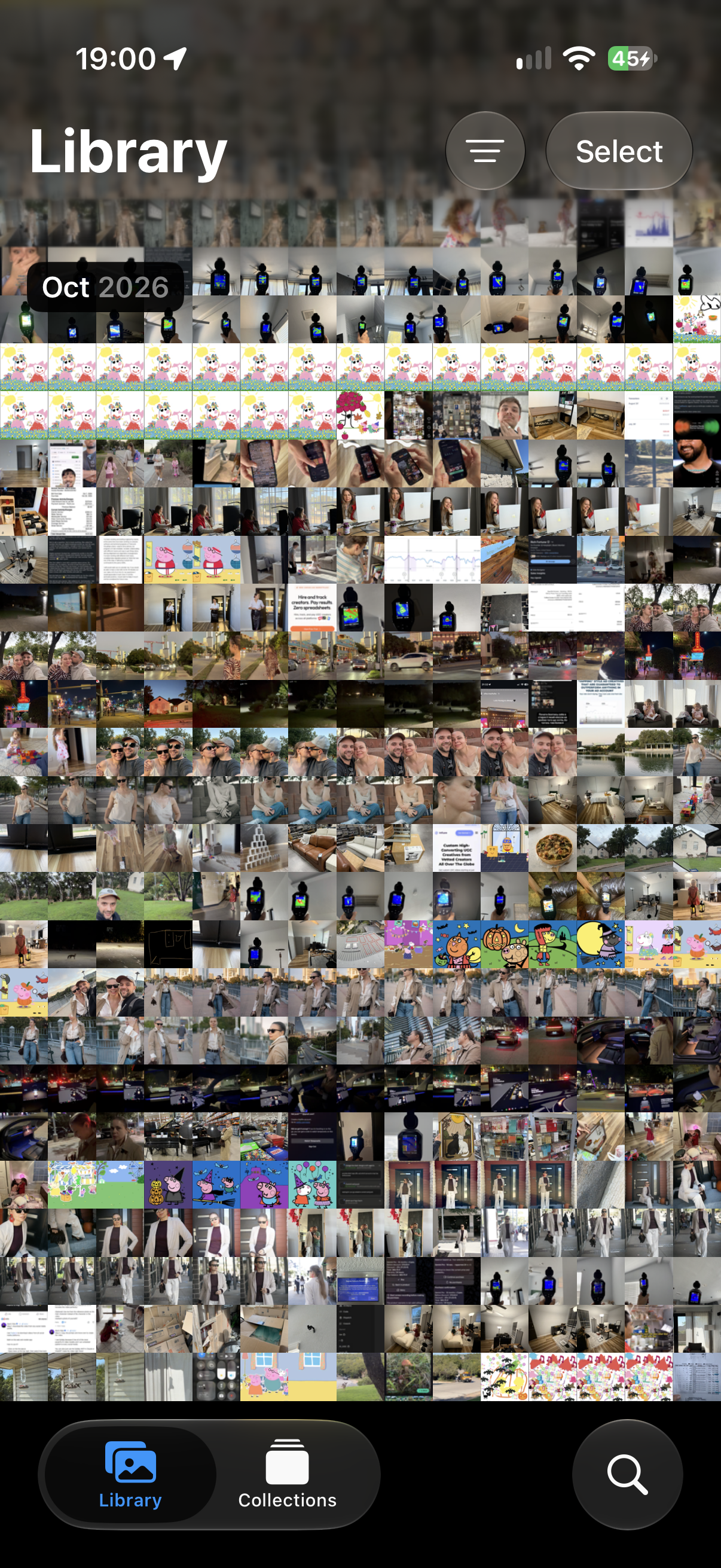 Photos Library with the Sort and Filter button beside Select at the top right