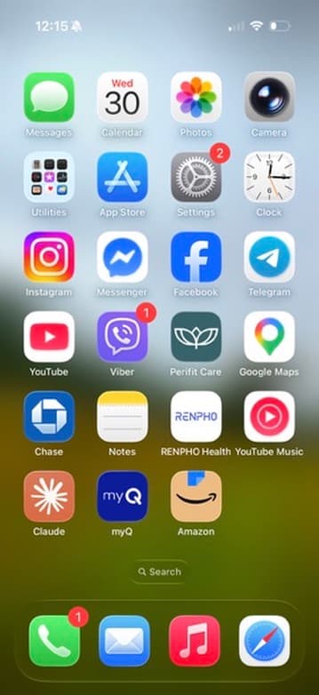 iPhone Home Screen with Photos in the top row